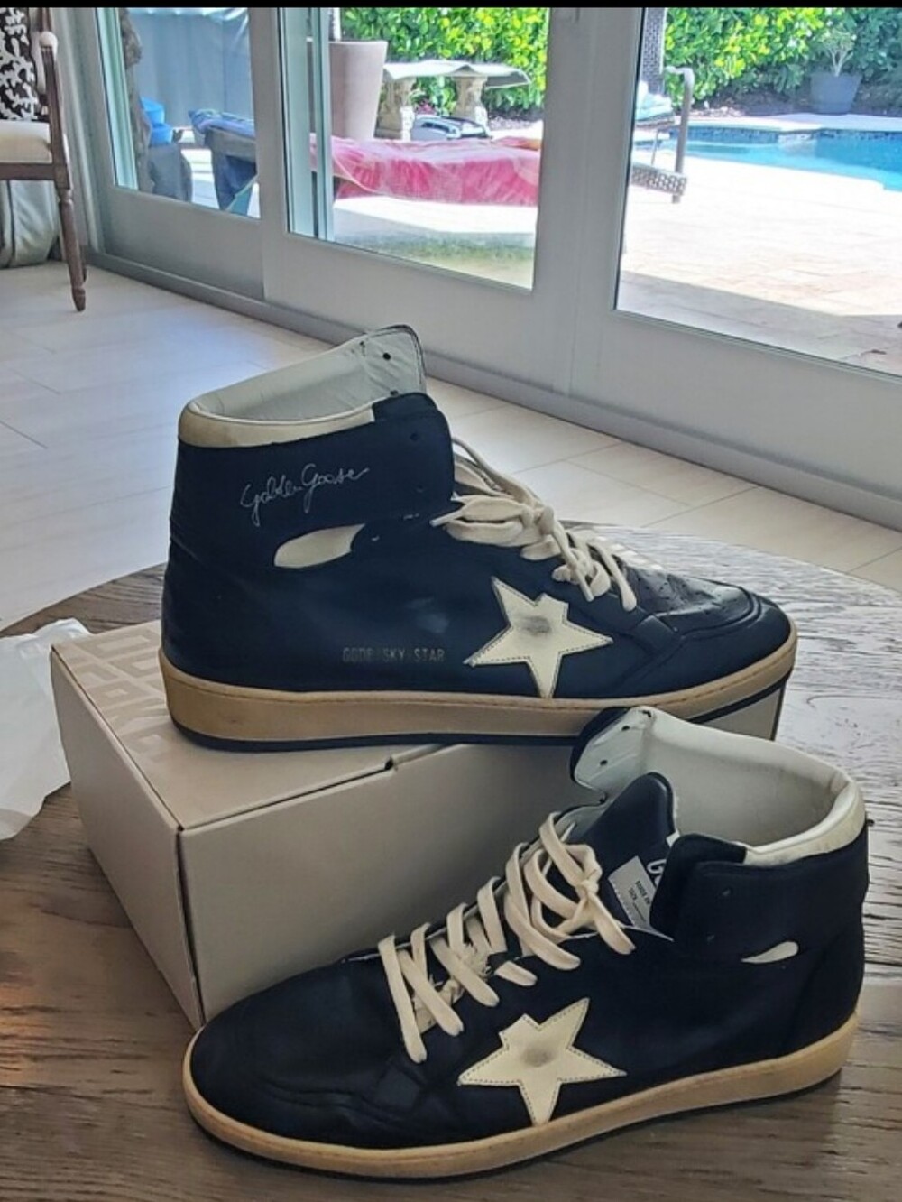 Golden Goose Black and White Mid-Top Sneakers
